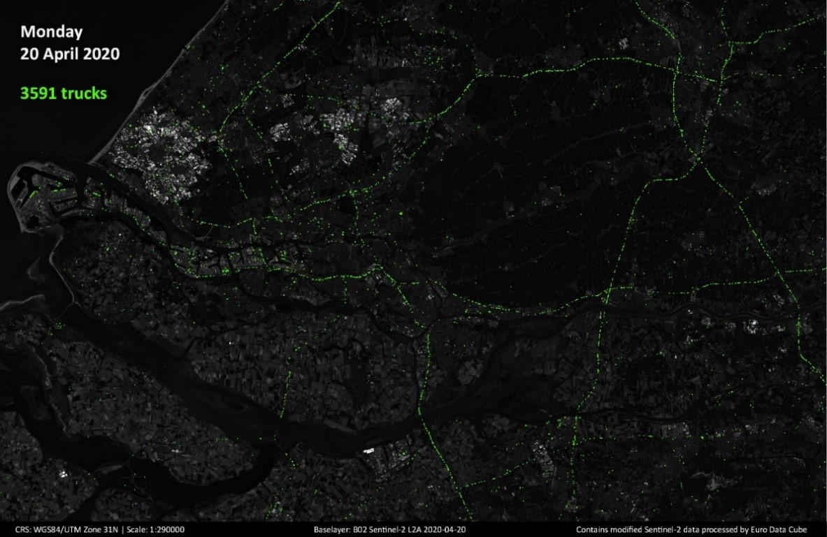 An image of Rotterdam, Netherlands, with green dots across the map identifying 3591 trucks.